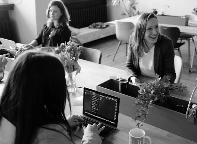 smiling women in workspace